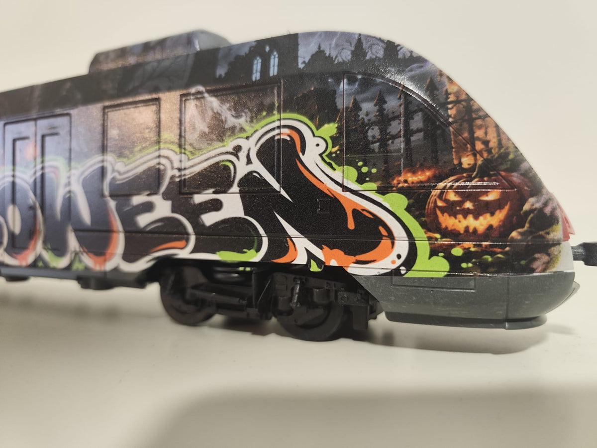 Front section of the one-of-one plastic Halloween graffiti train collectible